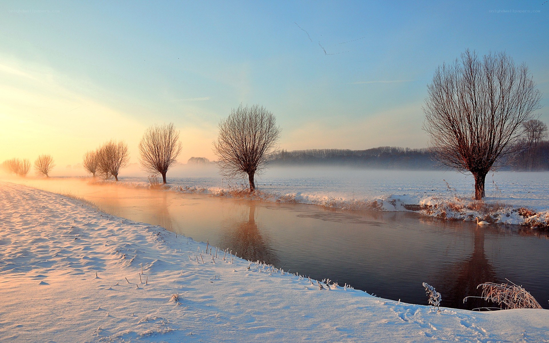 Winter river at sunrise