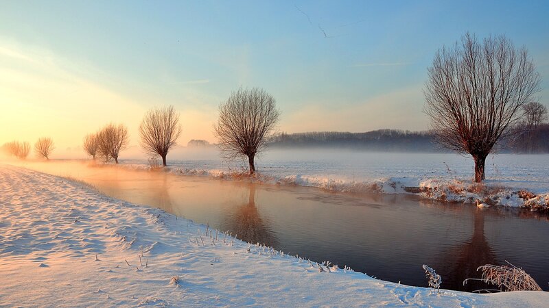 Winter river at sunrise