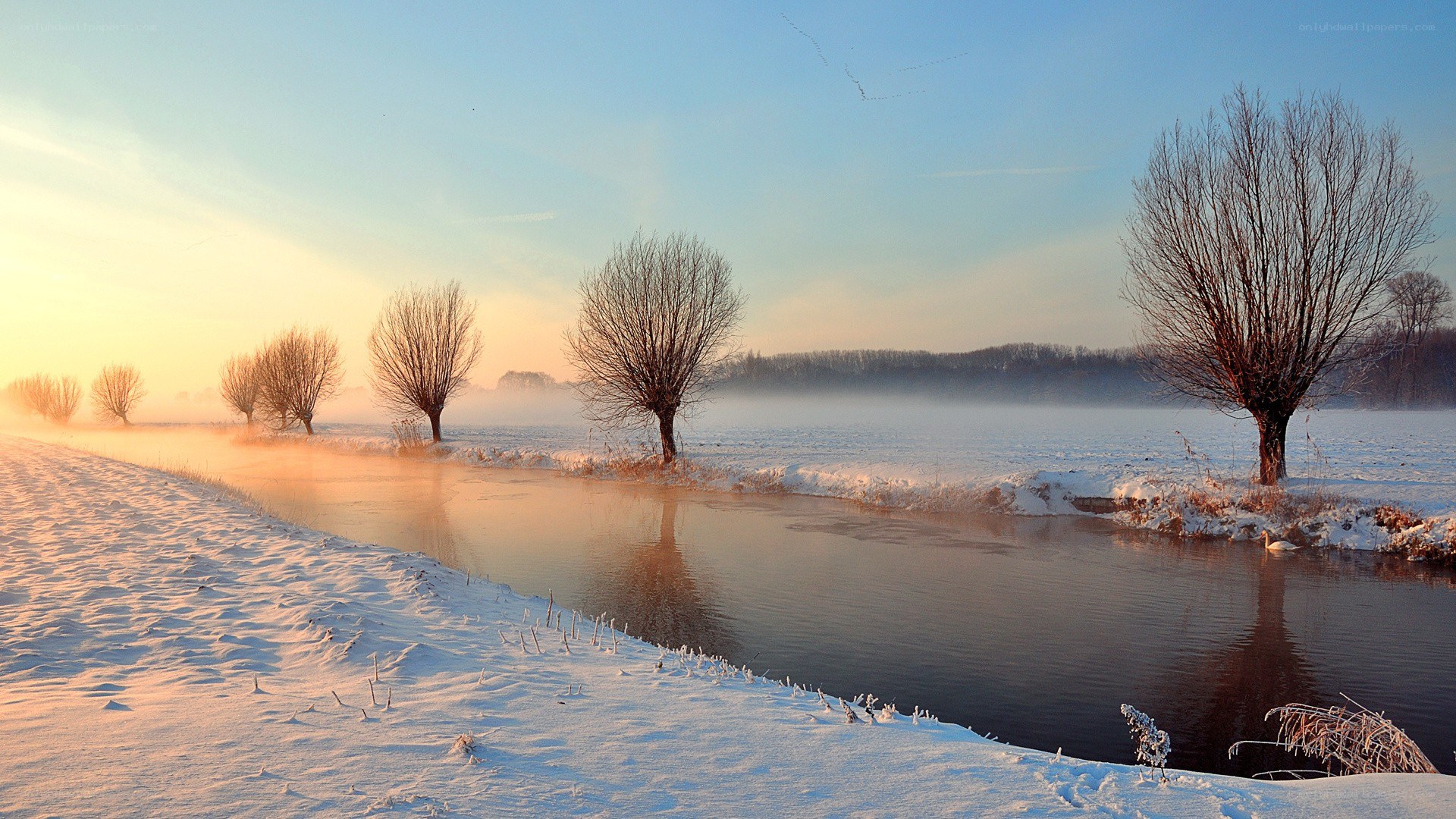 Winter river at sunrise