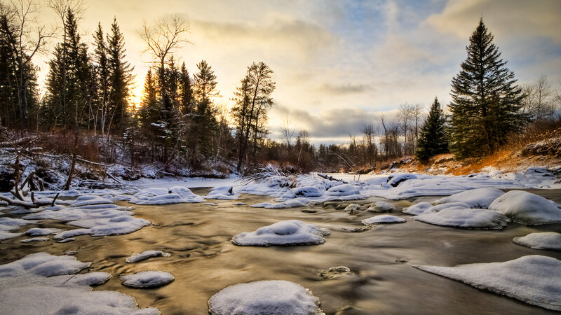 Winter river at sunset