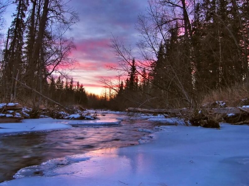 Winter river at sunset