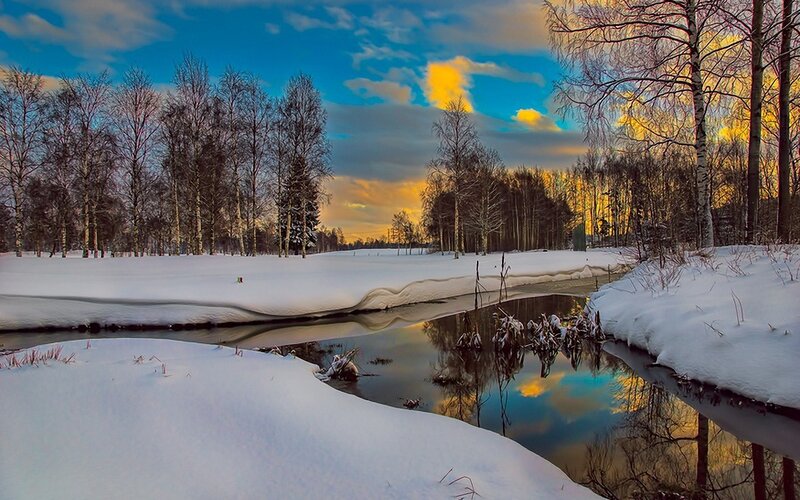 Winter river at sunset