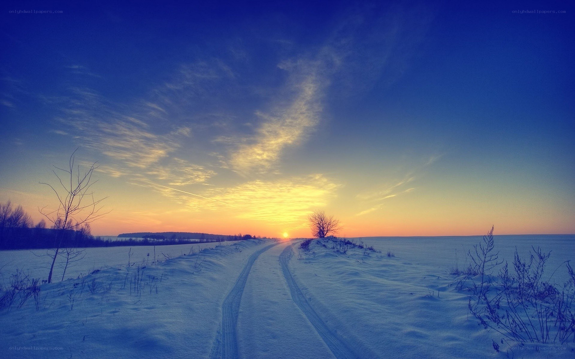 Winter road at sunset
