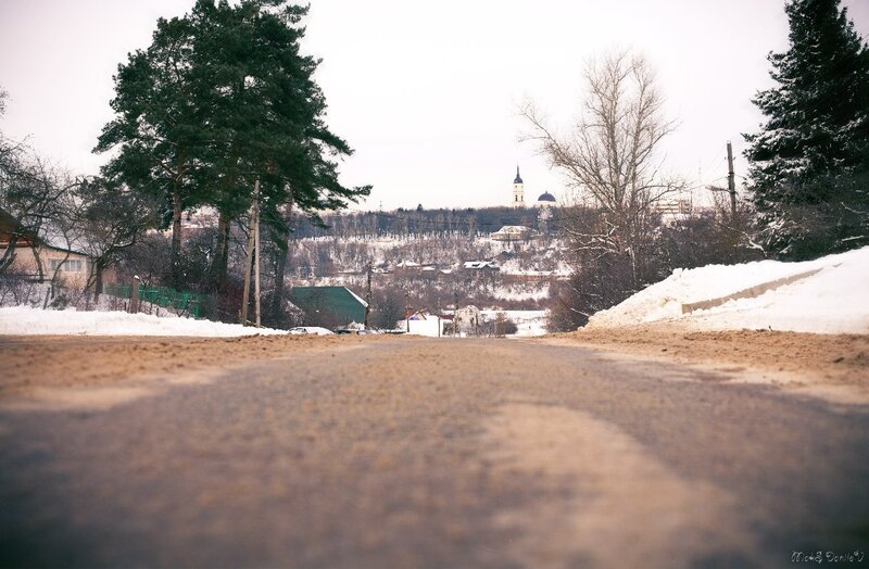Winter road to a town