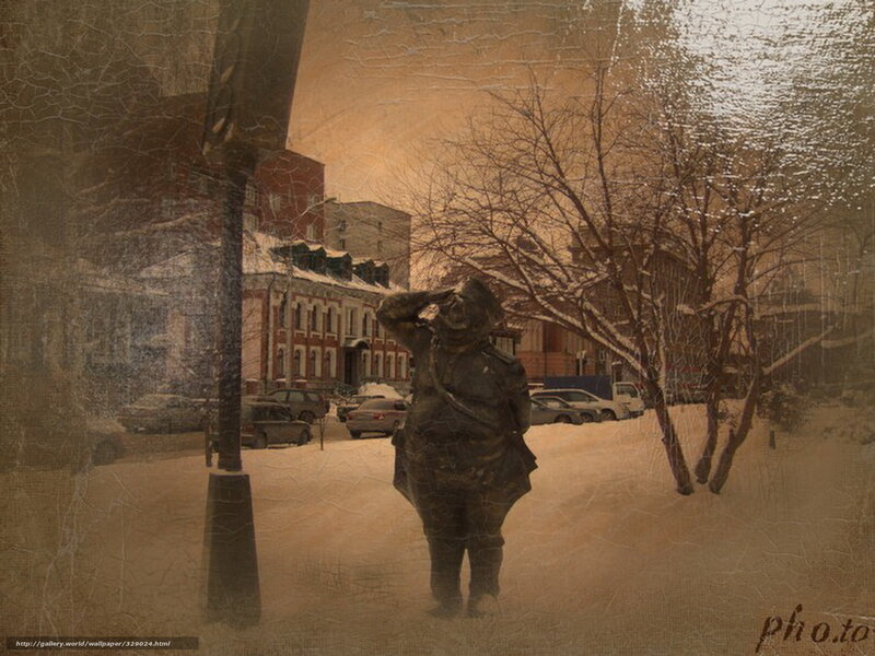 Winter street with statue