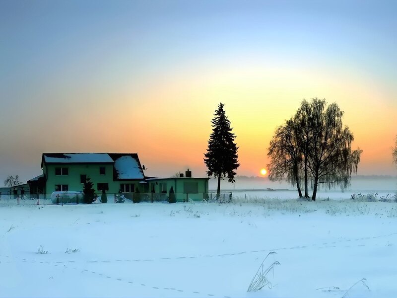 Winter sunset at a house
