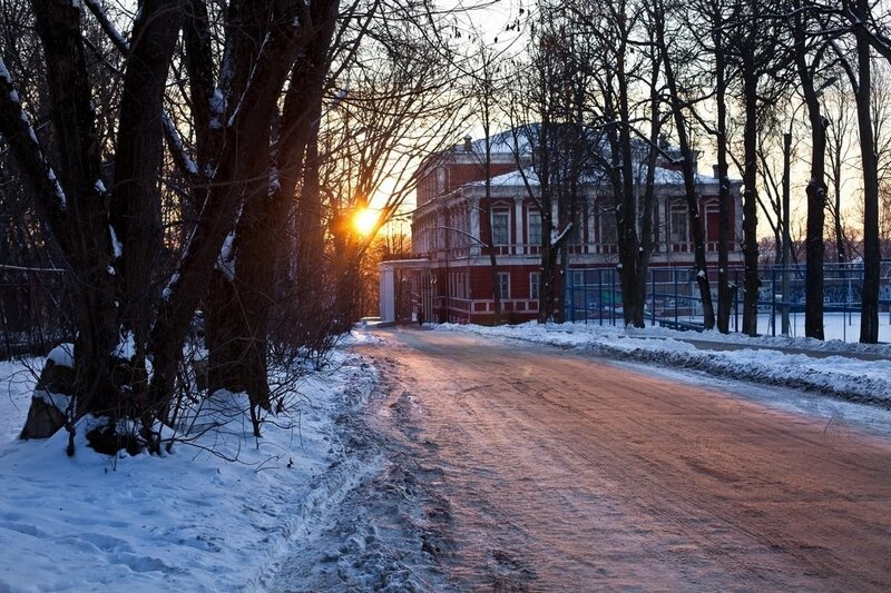 Winter sunset at a red building