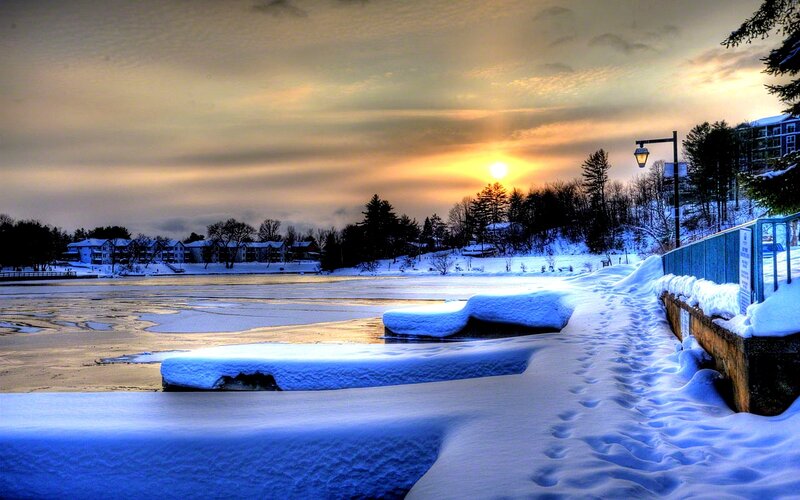 Winter sunset over a frozen lake
