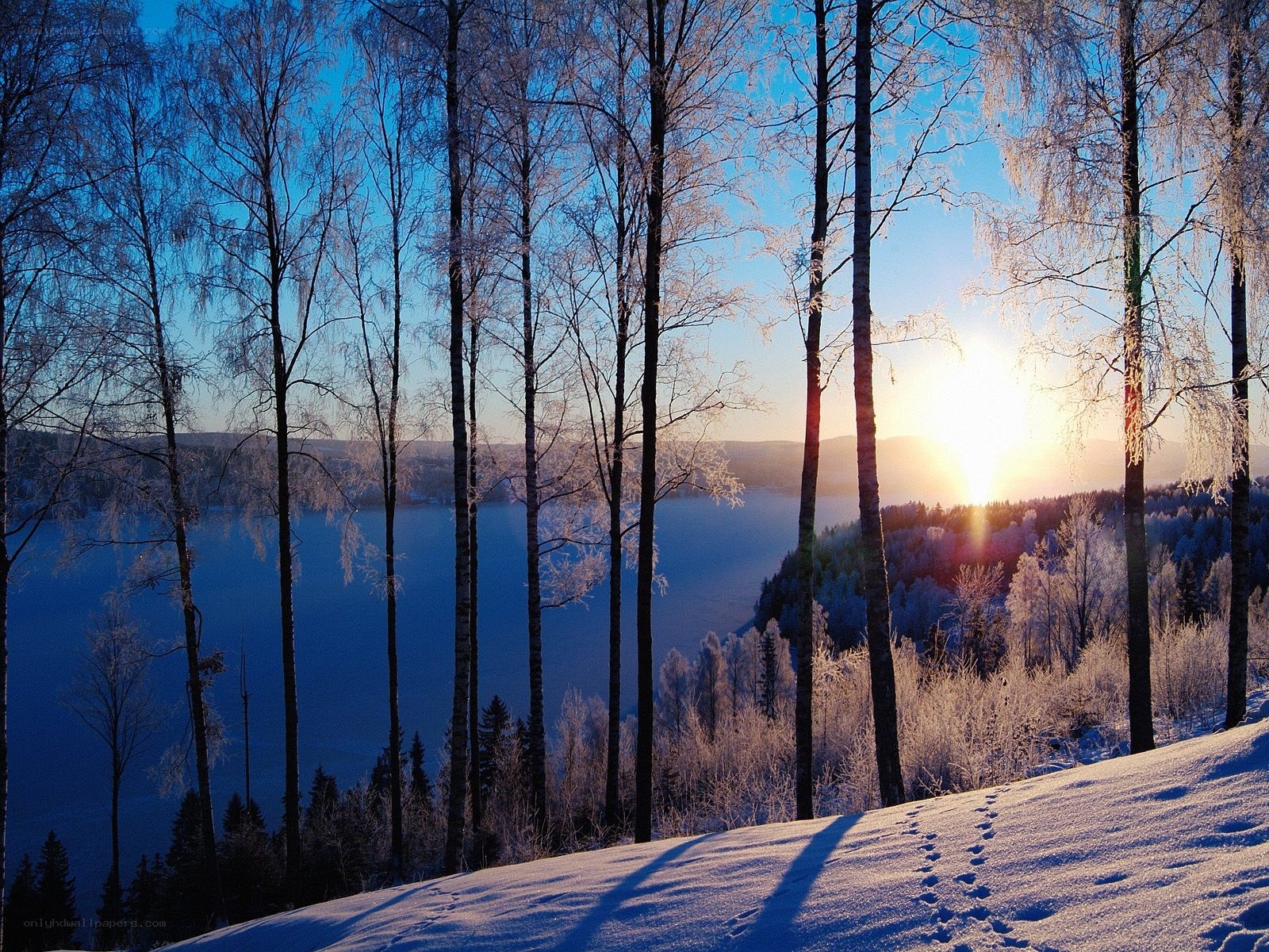 Winter sunset over a frozen lake