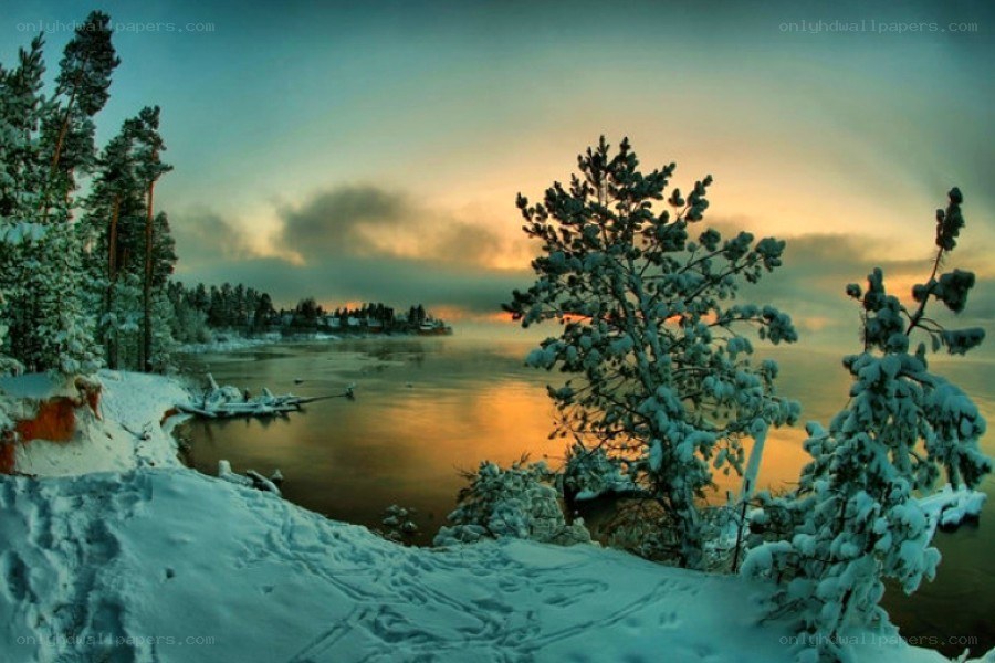Winter sunset over a frozen lake