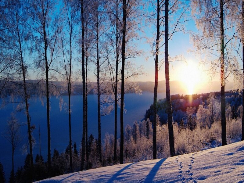 Winter sunset over a frozen lake