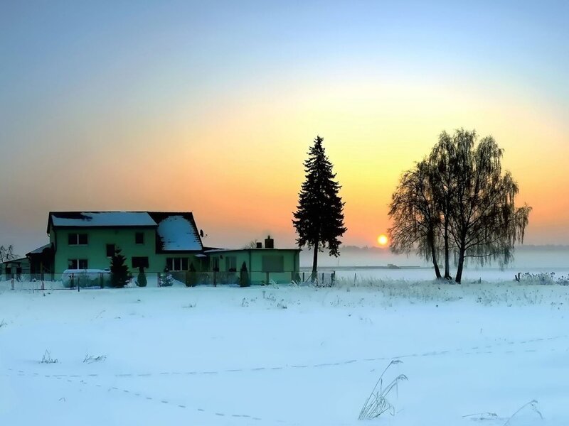 Winter sunset over a house