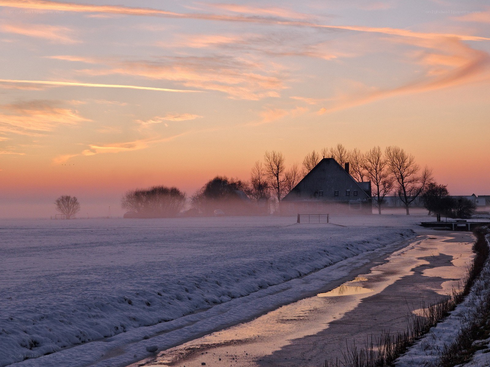 Winter sunset over a snowy field