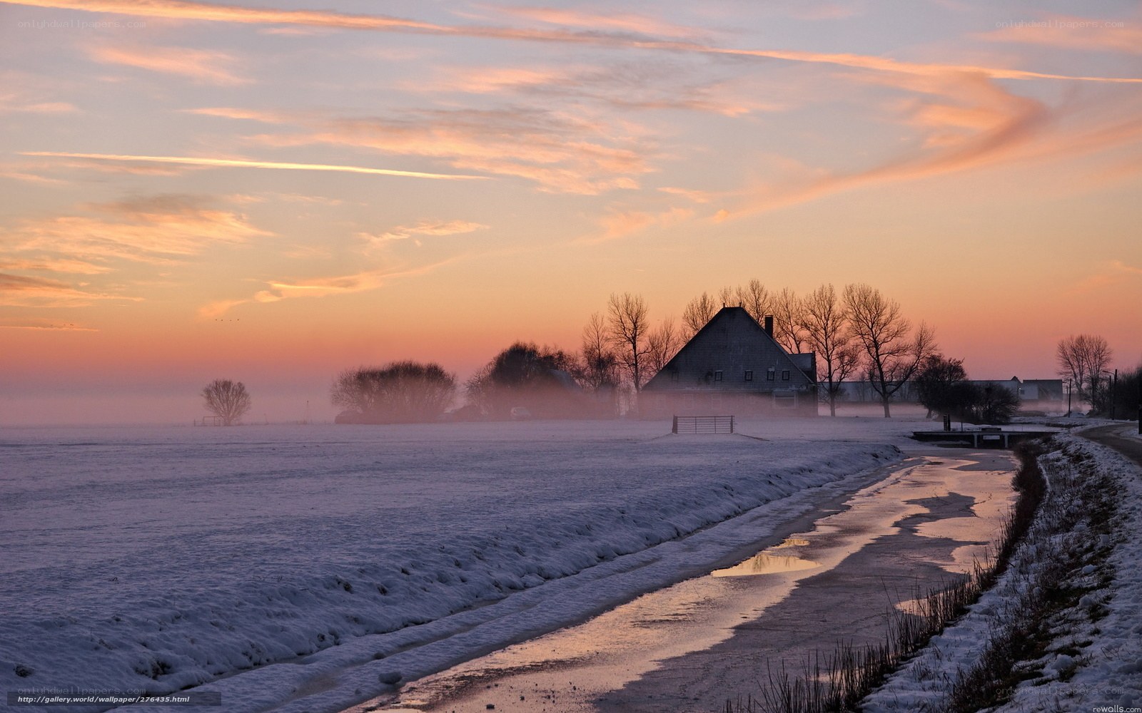 Winter sunset over a snowy field