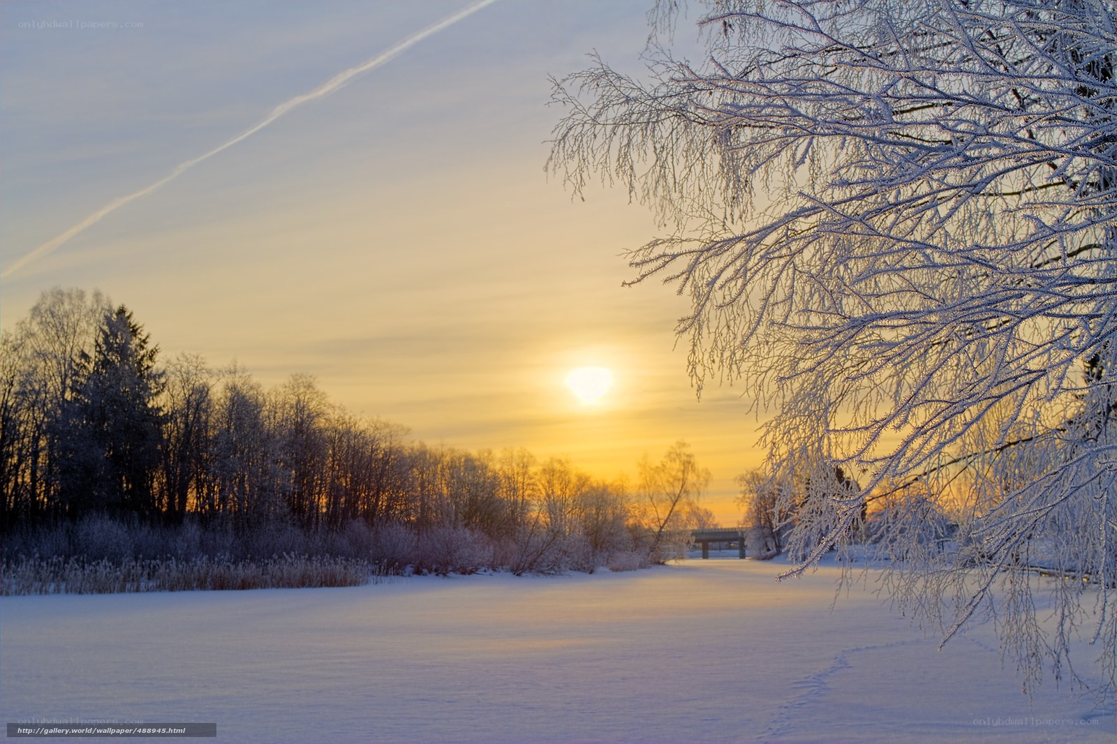 Winter sunset over snow-covered landscape