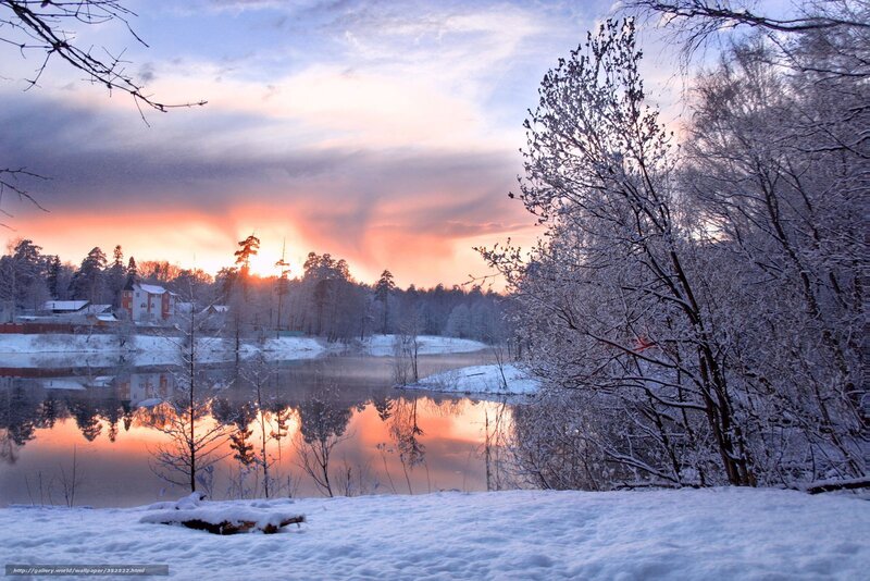 Winter sunset over snowy river