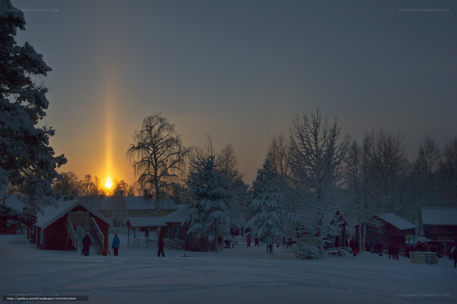 Winter sunset with sun pillar