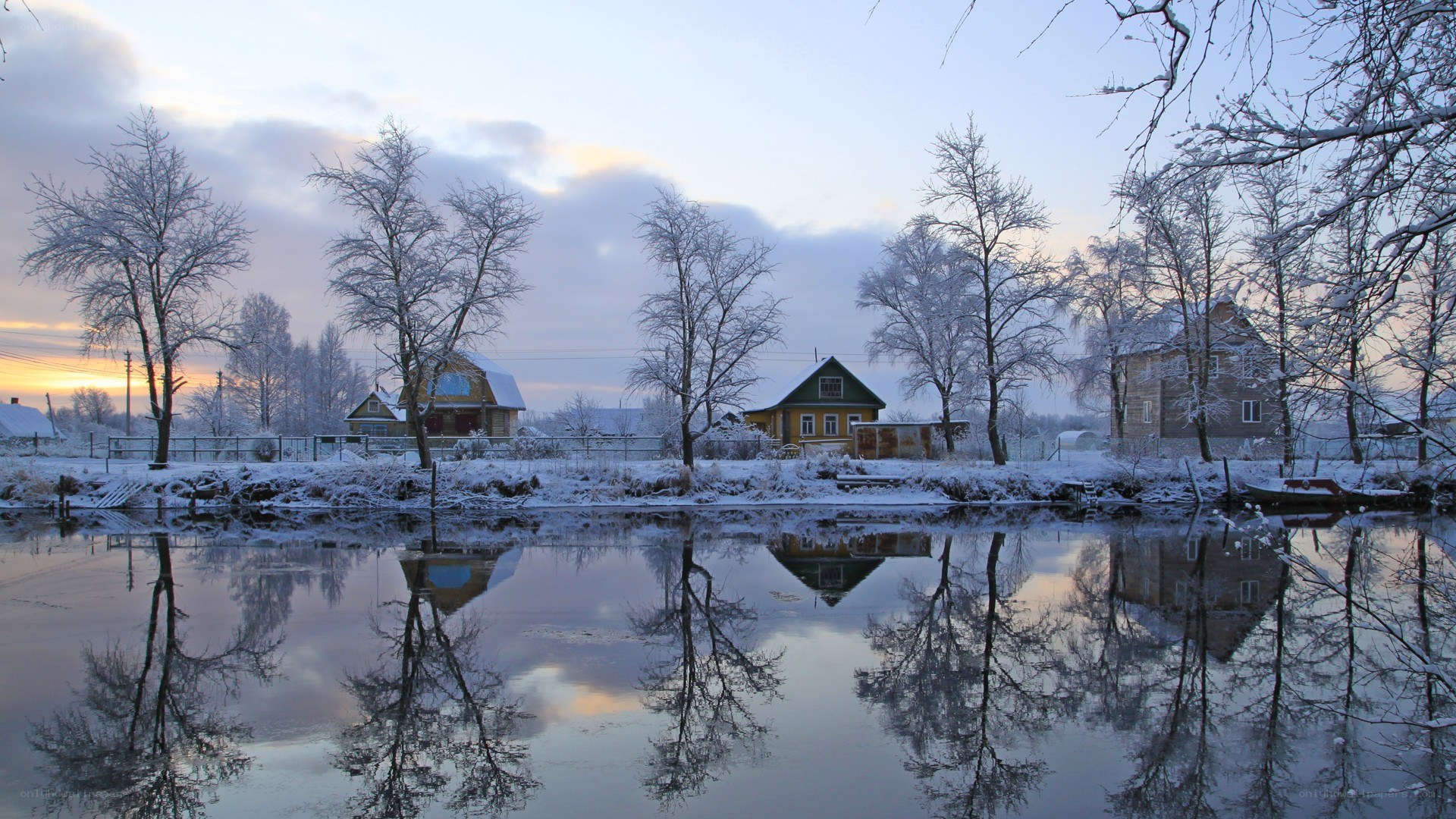 Winter village by the river