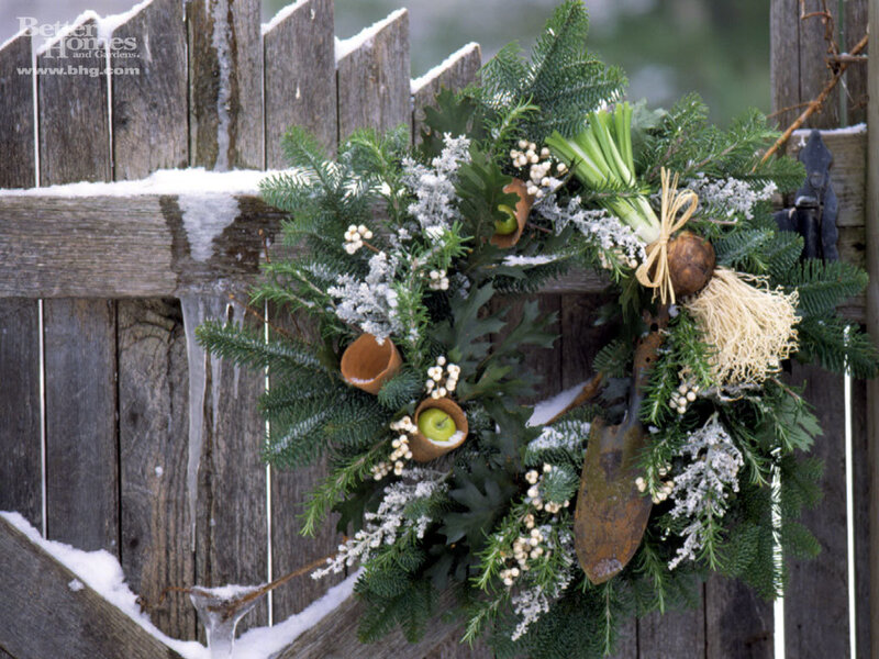 Winter wreath on wooden fence