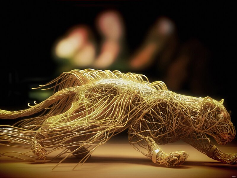Wire sculpture of a running animal