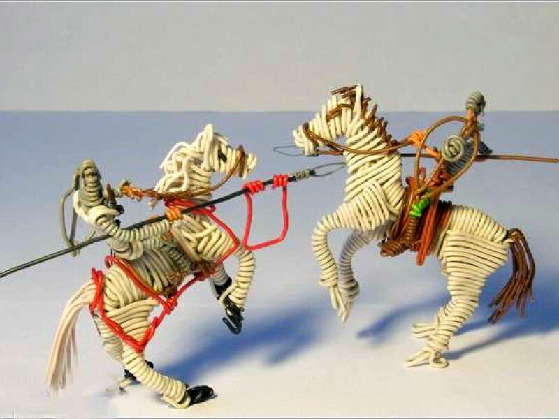 Wire sculptures of horse riders
