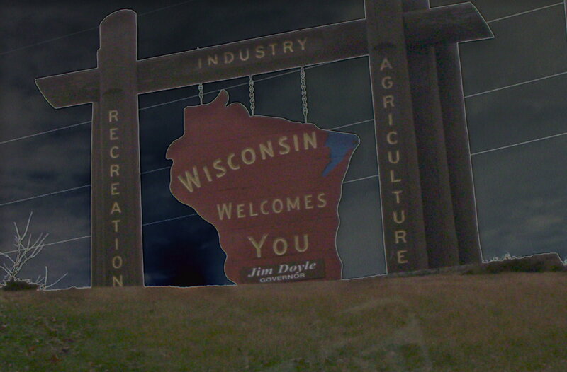 Wisconsin welcome sign at night