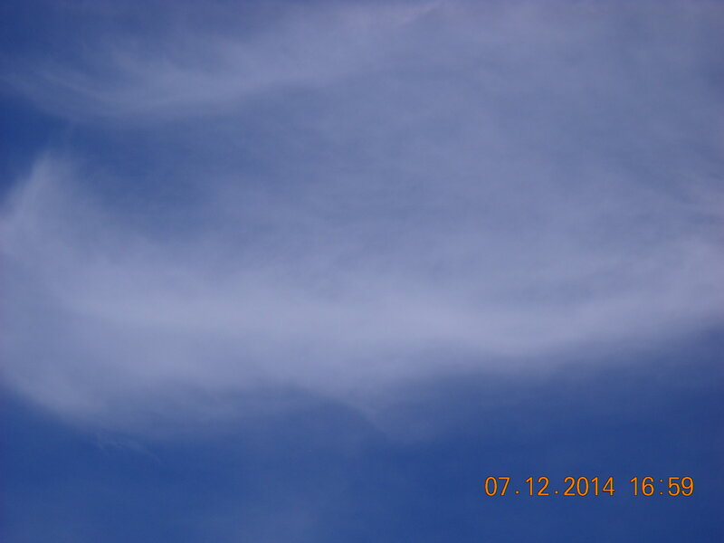 Wispy Clouds in Blue Sky — Calm