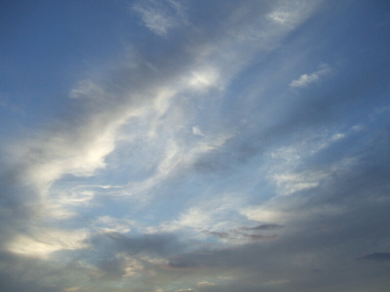 Wispy Clouds in Blue Sky — Serene, Sunset