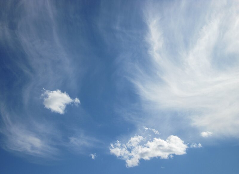 Wispy Clouds in Blue Sky — Serene
