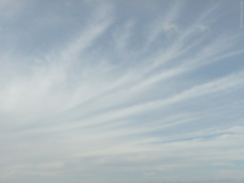 Wispy Clouds in Sky — Blue, Calm