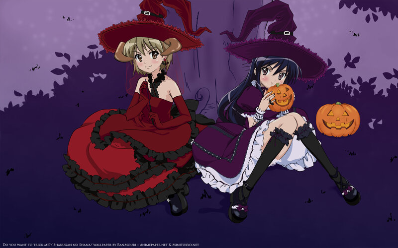 Witch girls with pumpkins
