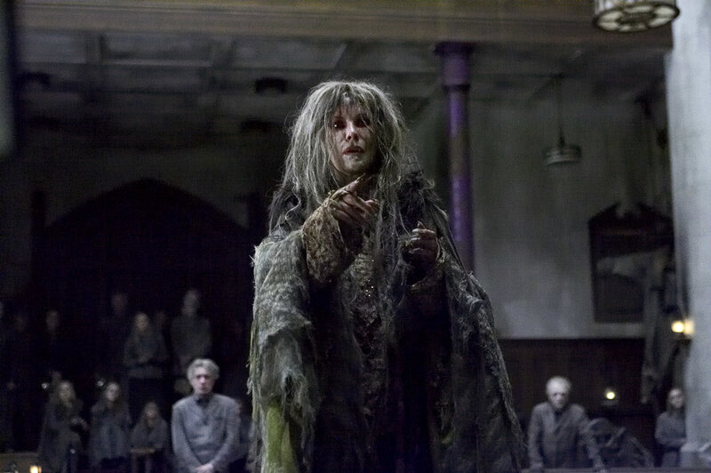 Witch in a dark hall