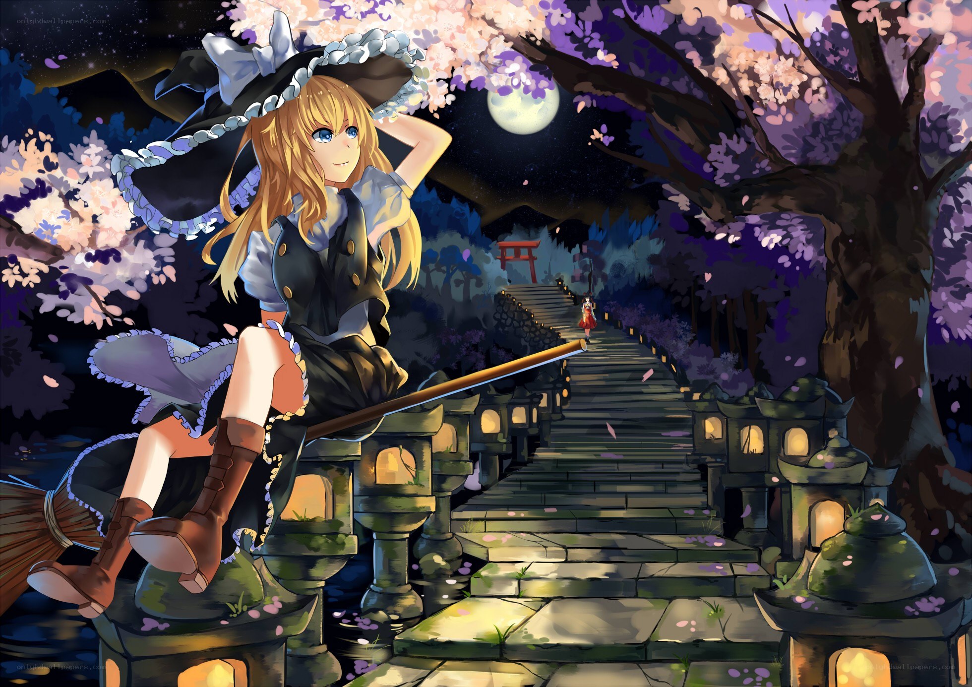 Witch on a broom at night