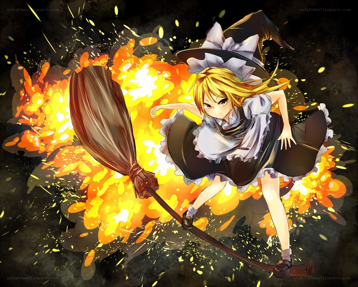 witch on a broom with fire
