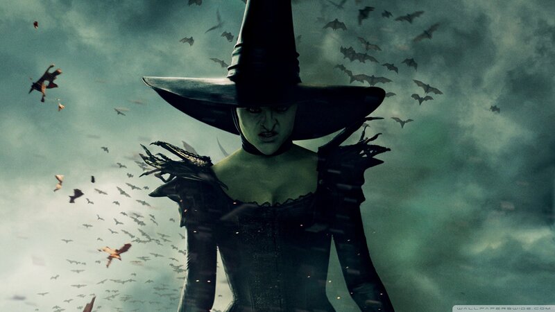 Witch with bats in storm