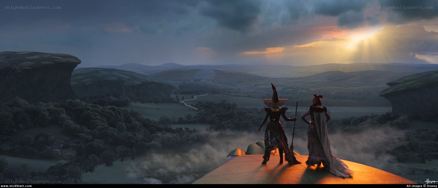 Witches on a cliff at sunset