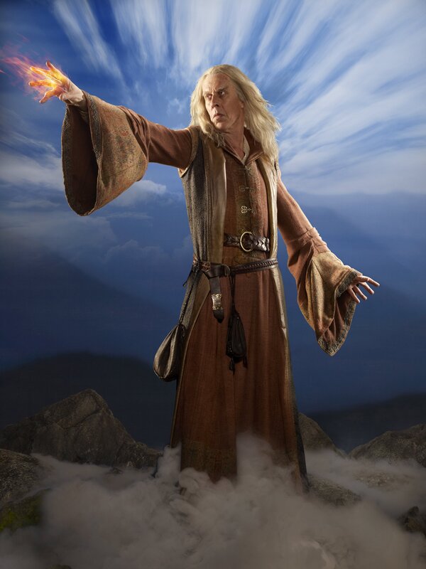 Wizard casting spell on mountain