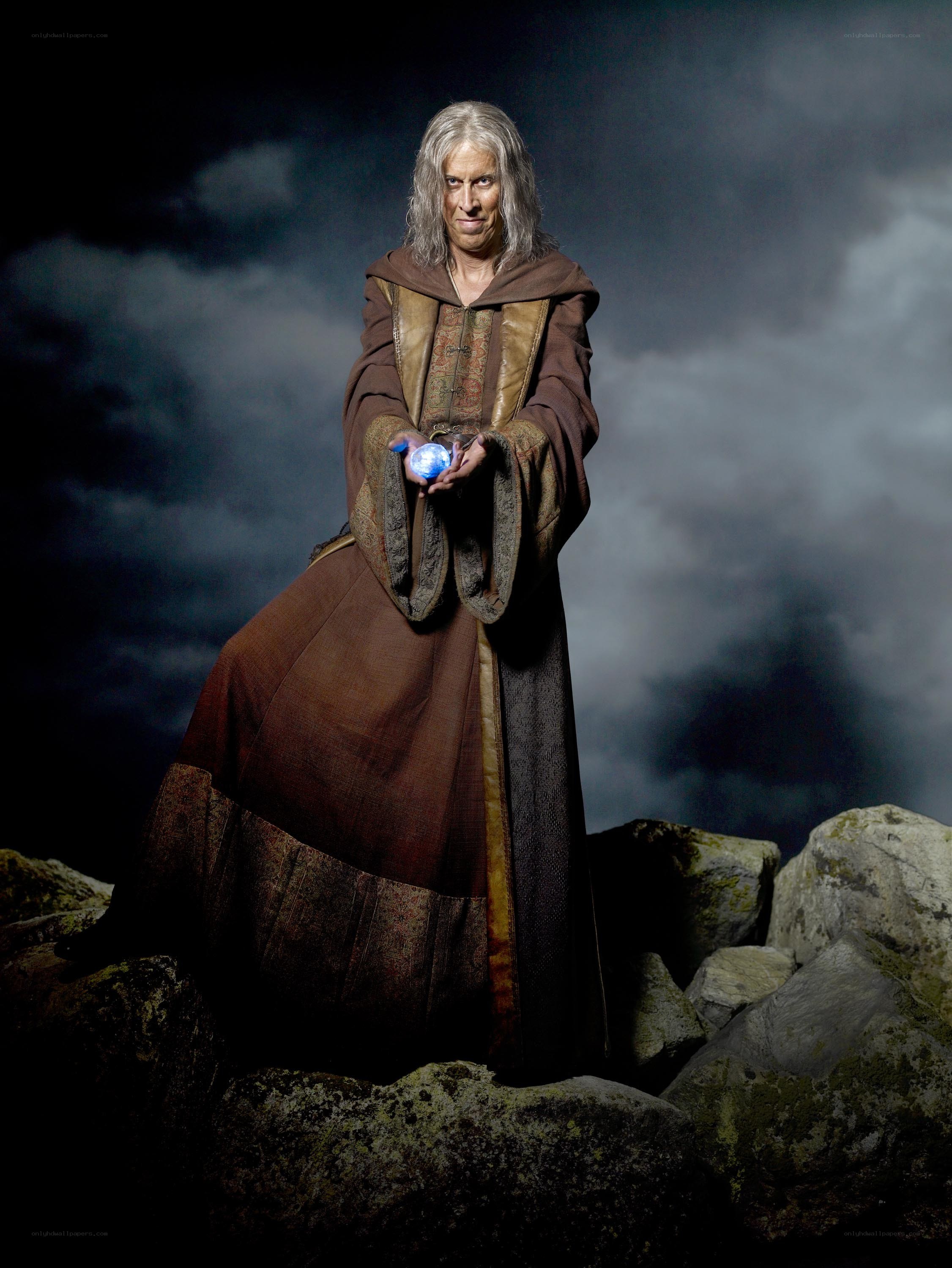 Wizard holding a glowing orb