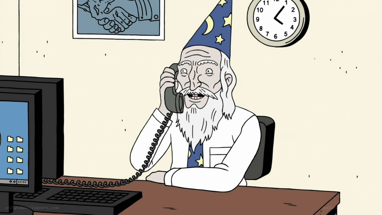 wizard on the phone at desk