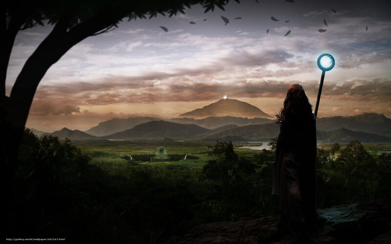 Wizard overlooking a mystical landscape