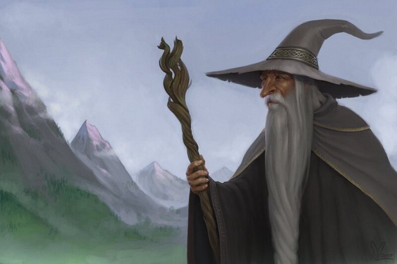 Wizard with staff in mountains