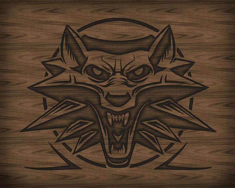 wolf head emblem on wood