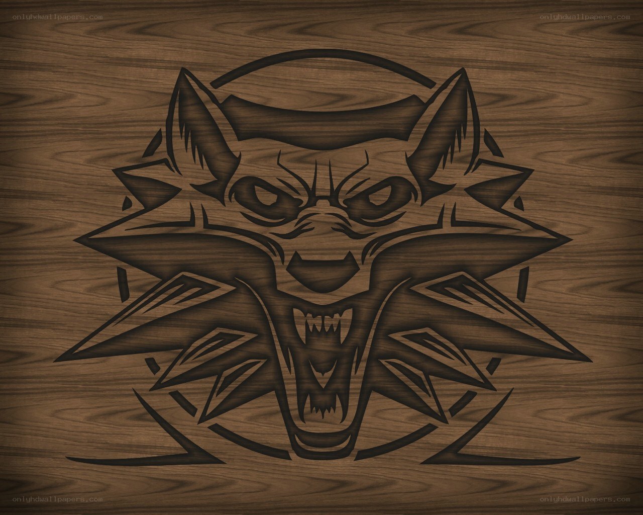 wolf head emblem on wood
