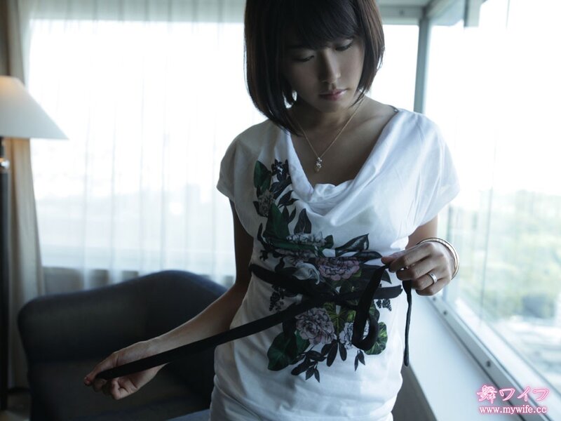 woman adjusting a belt