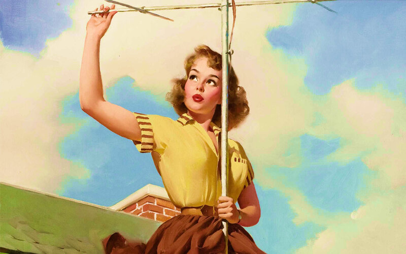 woman adjusting antenna on roof