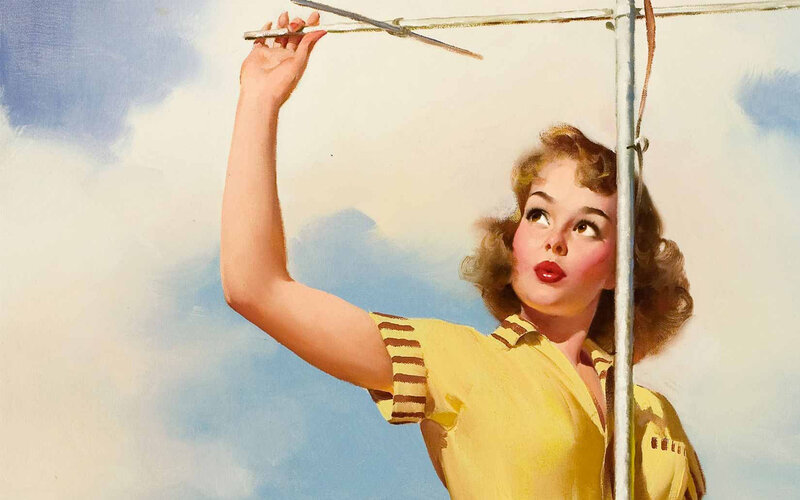 woman adjusting antenna