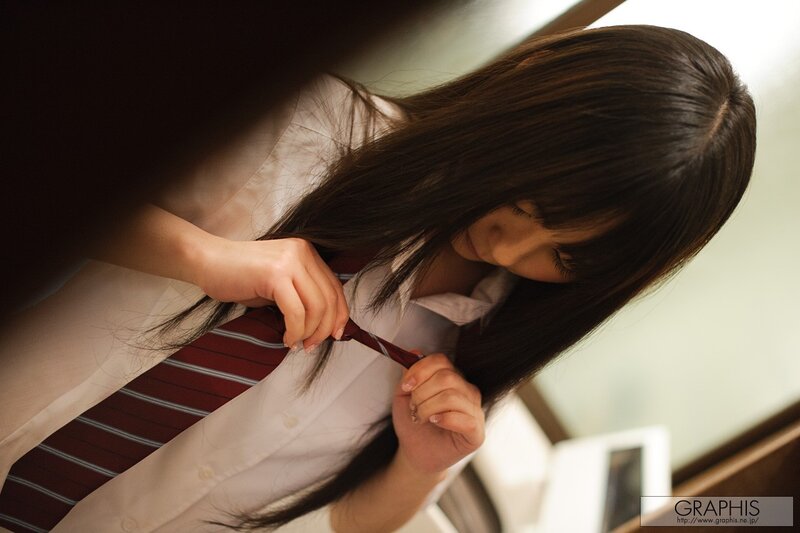 Woman Adjusting Tie — White, Calm