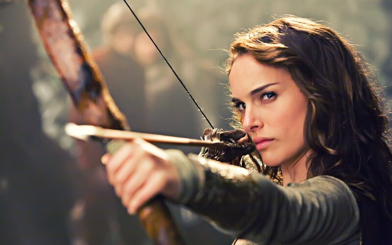 Woman aiming a bow and arrow