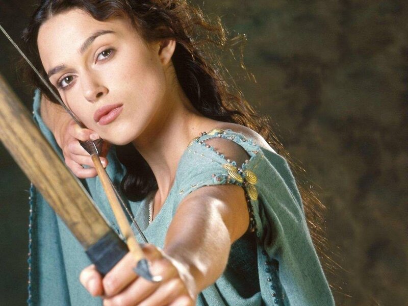 Woman aiming a bow and arrow