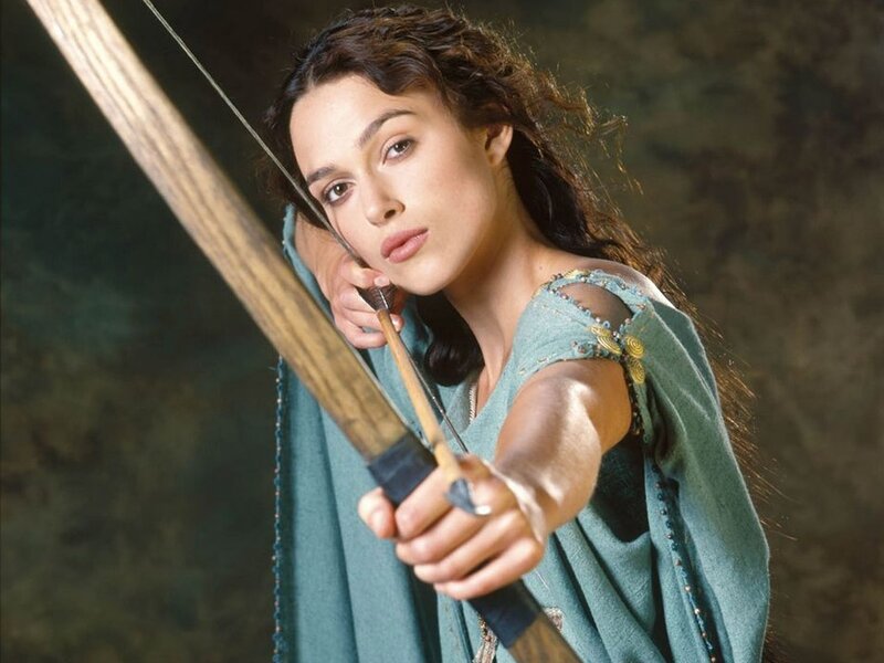 Woman aiming a bow and arrow